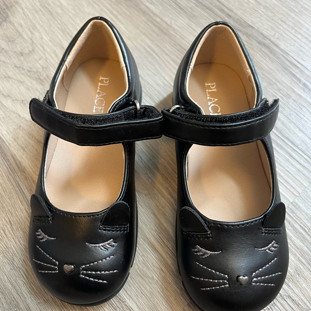Place Black Dress Shoes with Cat Design
